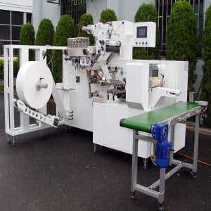 Machine de traitement et d'emballage automatique de lingettes humides - Traitement et emballage entièrement automatiques de lingettes humides
