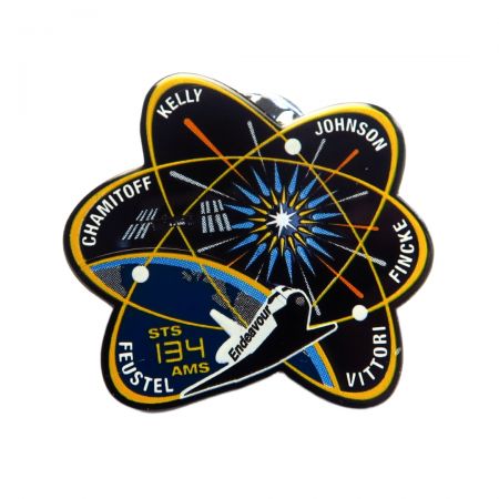 Printed Space Badge - Using automatic printing equipment to customize printed pins.