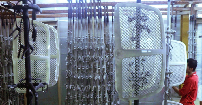 Cherng Yi Hsing (Electroplating Services Provider) puts plated parts on the racks before plastic plating starts. 