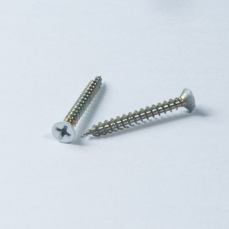 平頭十字寬牙尖尾 - 平頭螺絲打十字針孔搭配寬牙尖尾牙紋，並鍍上五彩鋅