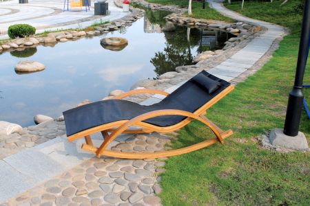 Outdoor solid wood lounge chair with armrests